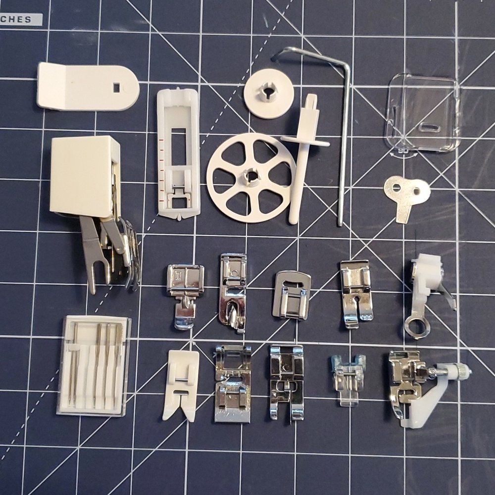 Singer sewing machine accessories/ feet